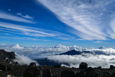 Scenic view of landscape against blue sky