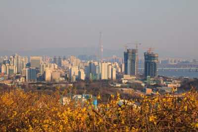 View of cityscape against clear sky