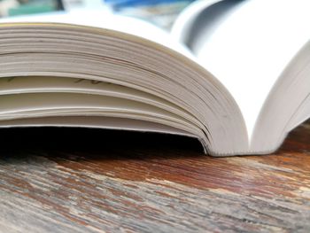 Close-up of open book on table