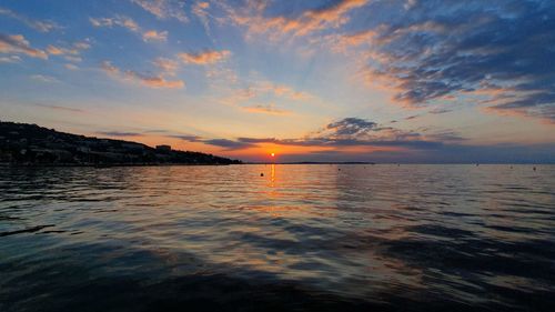 Scenic view of sea against sky during sunset