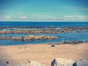 Scenic view of beach against sky