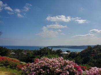 Scenic view of sea against cloudy sky