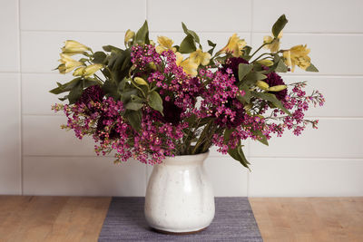 Flowers in vase on table