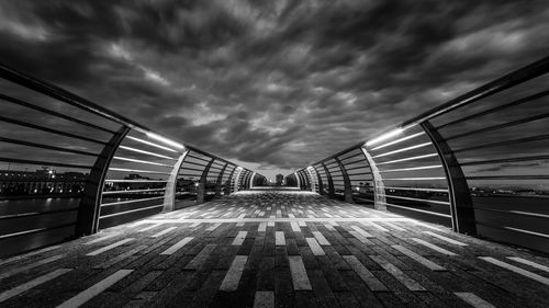 View of bridge against cloudy sky