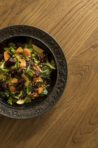 High angle view of salad in bowl on table