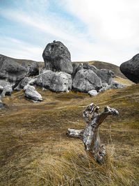 Rocks on land against sky