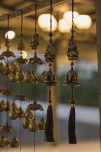 Close-up of lighting equipment hanging on ceiling