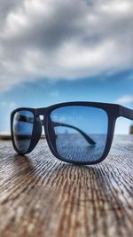 Close-up of sunglasses on table