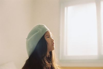 Girl looking up at home