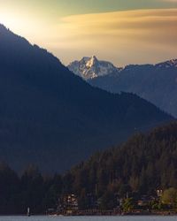 Scenic view of mountains against sky during sunset