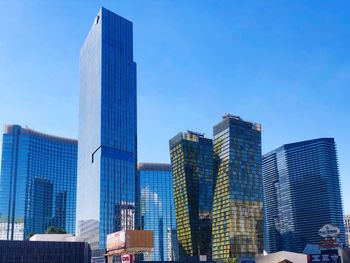 Modern buildings against blue sky