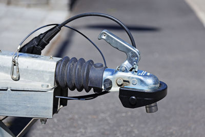 Close-up of bicycle on street