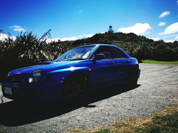 Car against blue sky