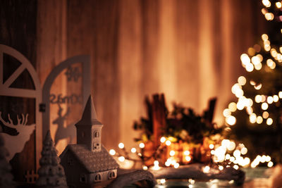 Illuminated christmas tree outside building