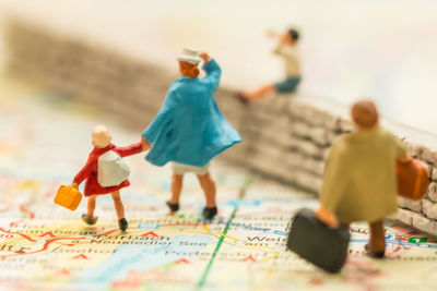 Close-up of figurines on map