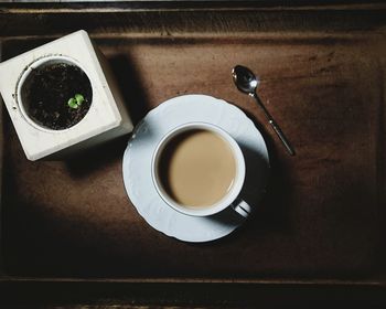 High angle view of coffee cup on table