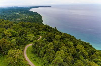 High angle view of road by sea against sky