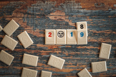 High angle view of information sign on table