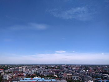 Cityscape against blue sky