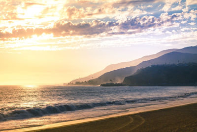 Scenic view of sea against sky during sunset