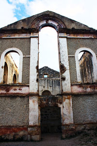 Low angle view of old building against sky