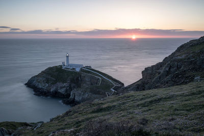 Scenic view of sea against sky at sunset