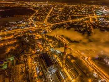 Aerial view of illuminated buildings at night