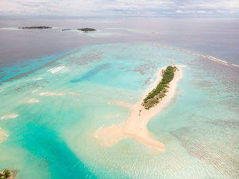 Aerial view of sea against sky