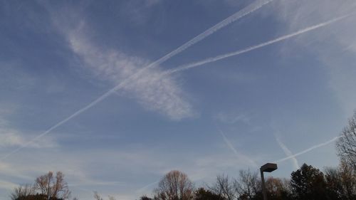 Low angle view of vapor trail in sky