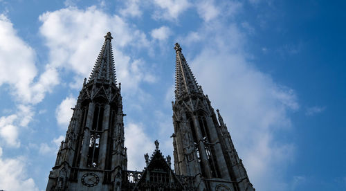 Low angle view of cathedral against cloudy sky