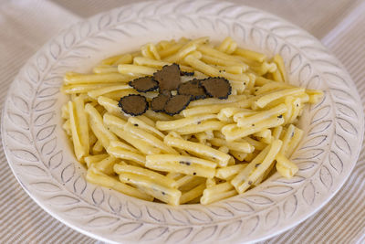 High angle view of pasta in plate on table