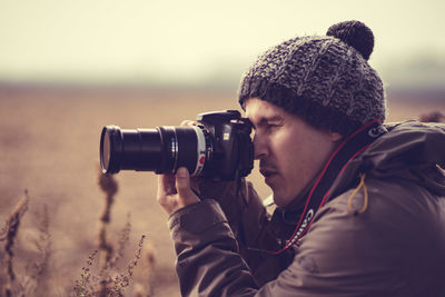 Portrait of photographer photographing