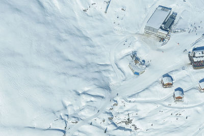 Aerial view of tourist resorts at swiss alps during winter