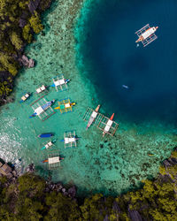 Aerial view of sailboats in sea