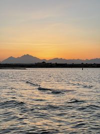 Scenic view of sea against sky during sunset