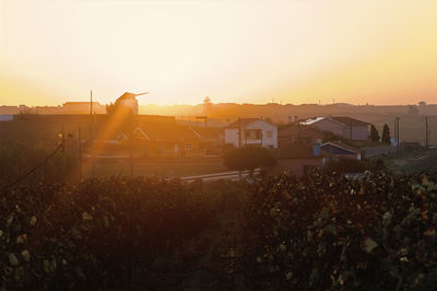 High angle view of cityscape against sky during sunset