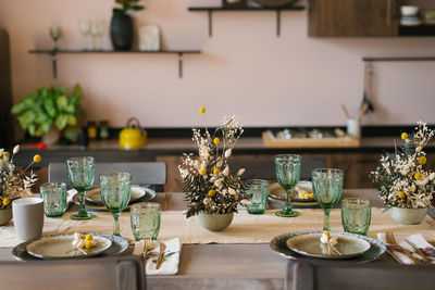 A beautiful festive dining table in the rustic style. dried flowers 