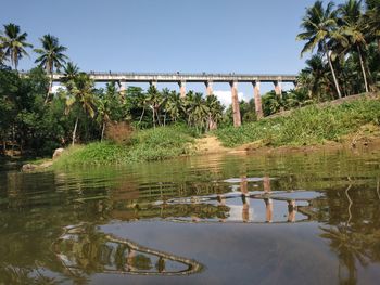 Bridge over river against sky