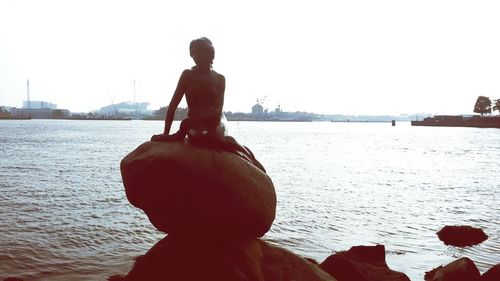 Woman looking at sea