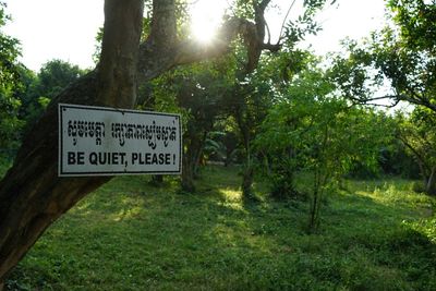 Information sign on tree trunk