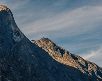 Layered steep rocky mountain