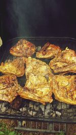 Close-up of meat on barbecue grill