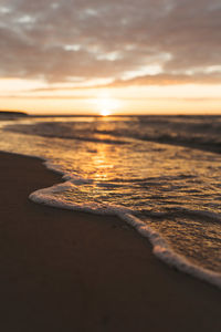 Scenic view of beach against sky during sunset baltic sea rostock