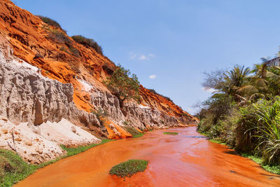 Fairy stream or suoi tien, red river between rocks and jungle. landmark in muine, vietnam