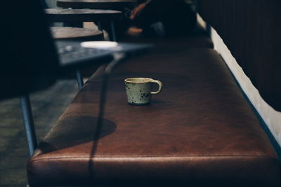 Close-up of coffee cup on table