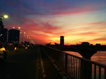 View of illuminated city at sunset