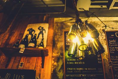 Close-up of illuminated lamp hanging at night