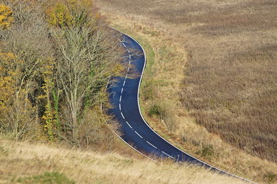 High angle view of road amidst field