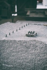 Close-up of cross on table