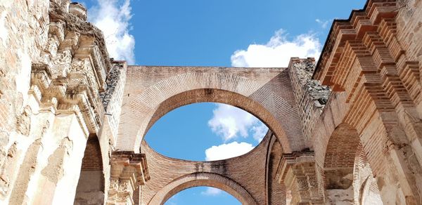 Cathedral ruin against blue sky